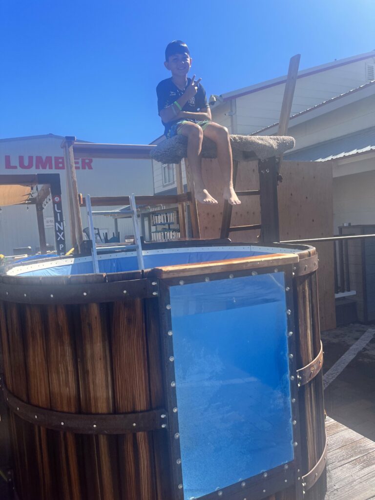 Coach and Player Dunk Tank at AYSO Fundrasier at High COuntry Lumber