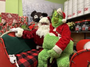 Santa and the Grinch at High Country Lumber